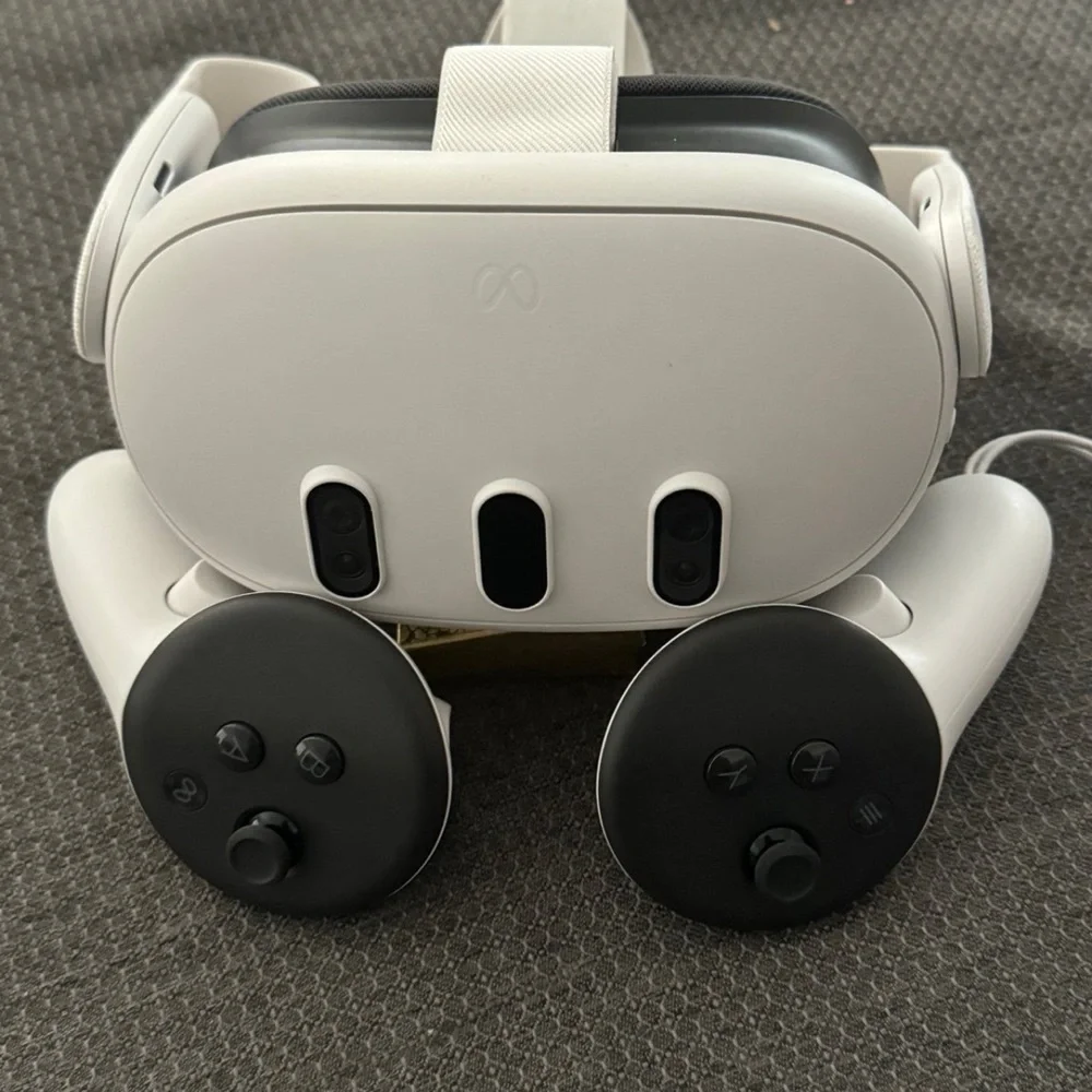 White VR Headset with Black Controllers